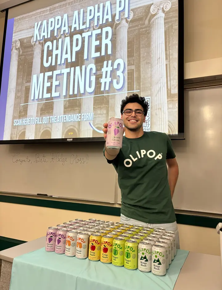EvolveZ college Brand Ambassador hosting a campus sampling activation for a CPG beverage brand